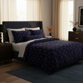 Serene cozy bedroom with Art Deco comforter in deep blue and black