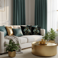 Sophisticated living room with white sofa and layered black teal gold floral pillows