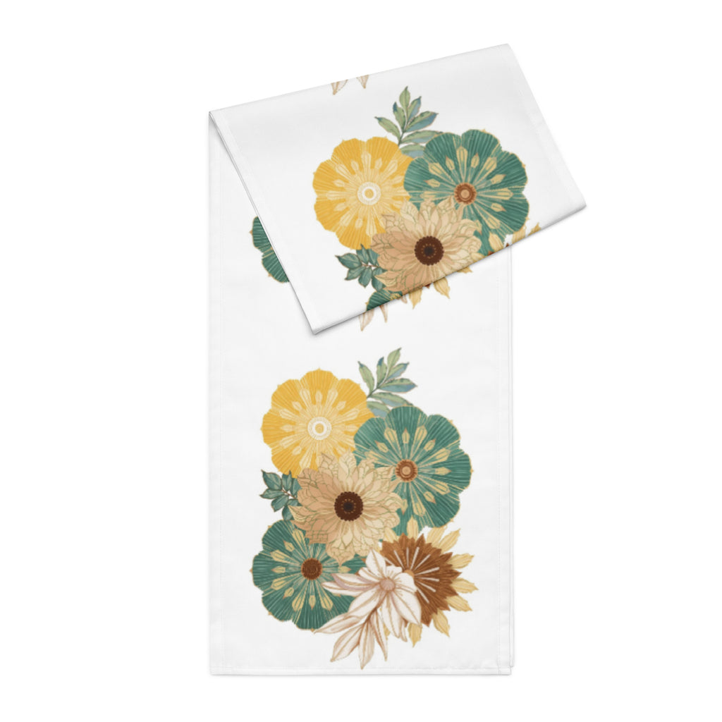 Sophisticated dinner table with floral runner in earth tones