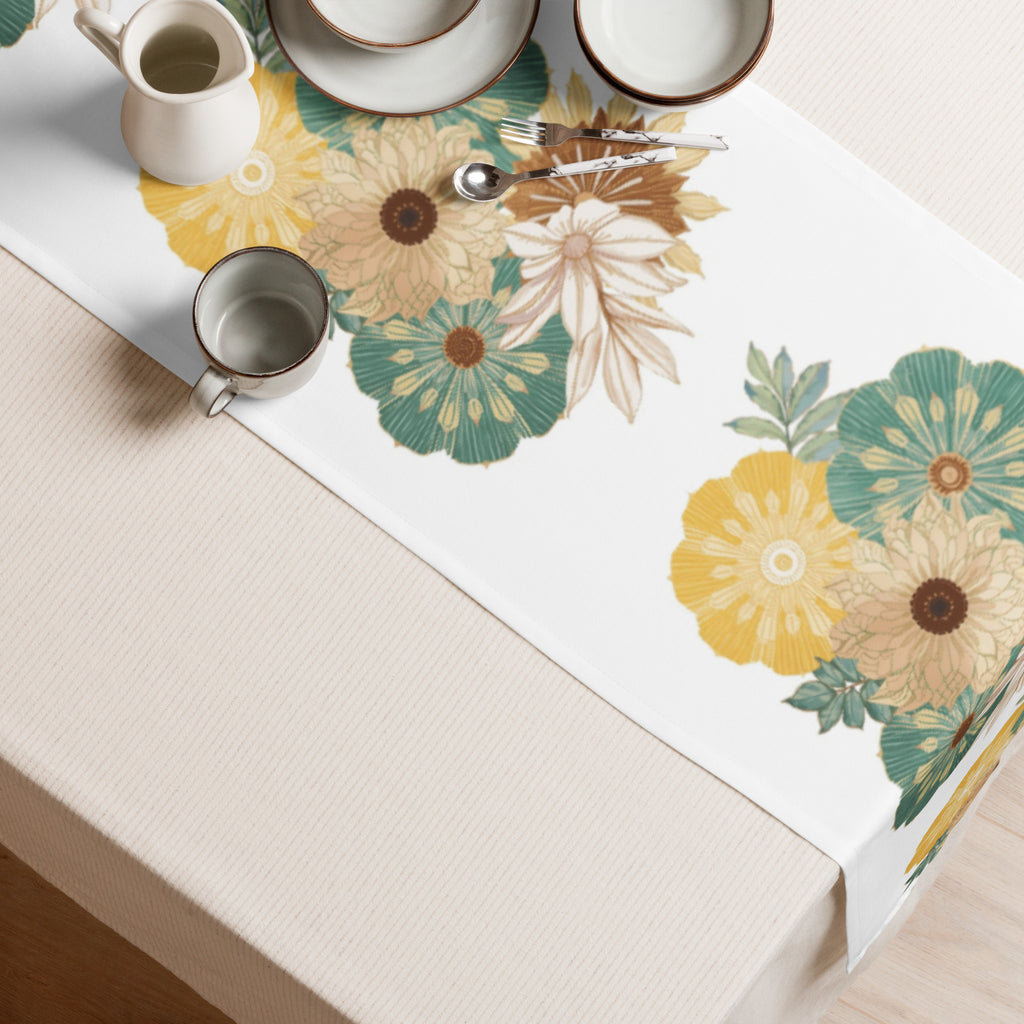 Sophisticated dinner table with floral runner in earth tones